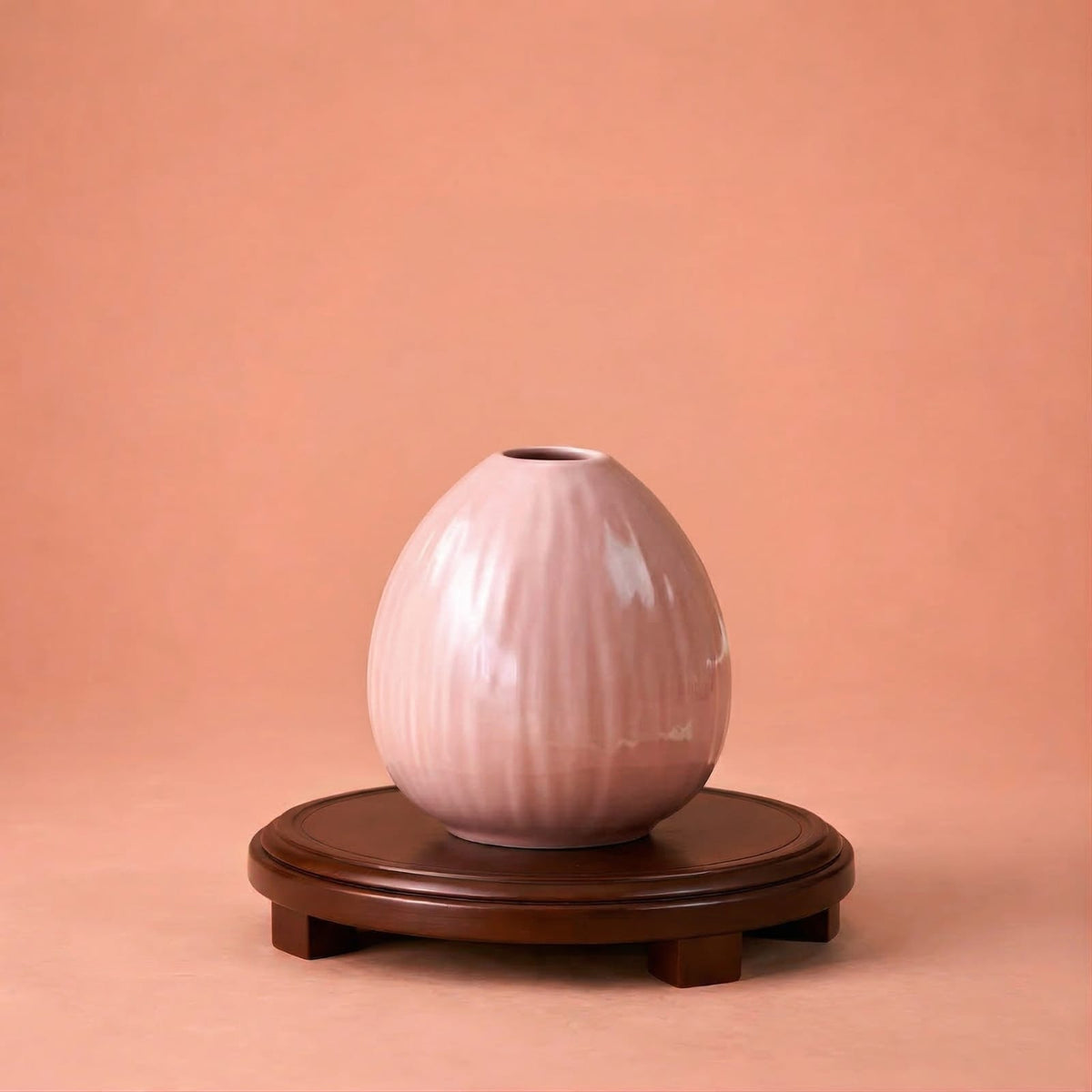 Petit vase de plante rose en céramique
