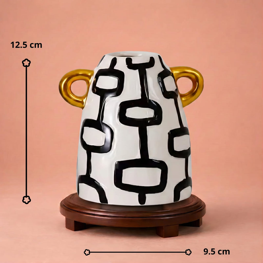 Vase graphique blanc et noir avec anses dorées