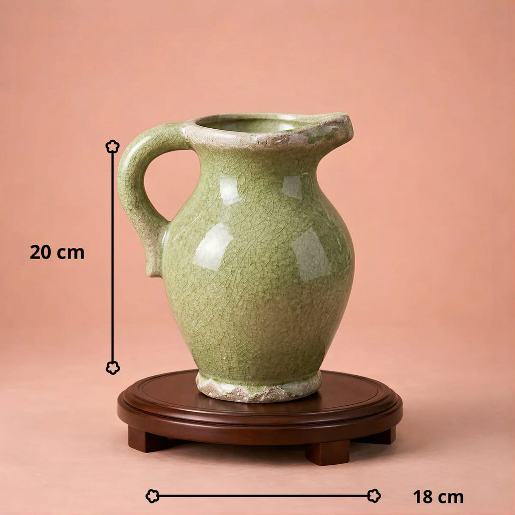 Vase vert en céramique à anse