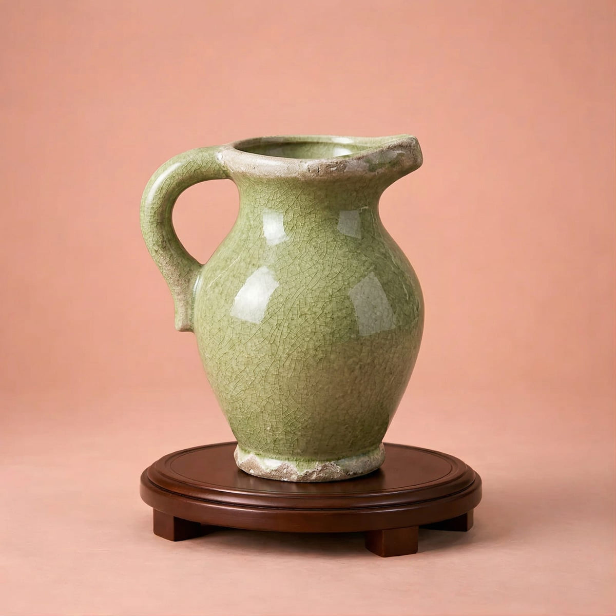 Vase vert en céramique à anse